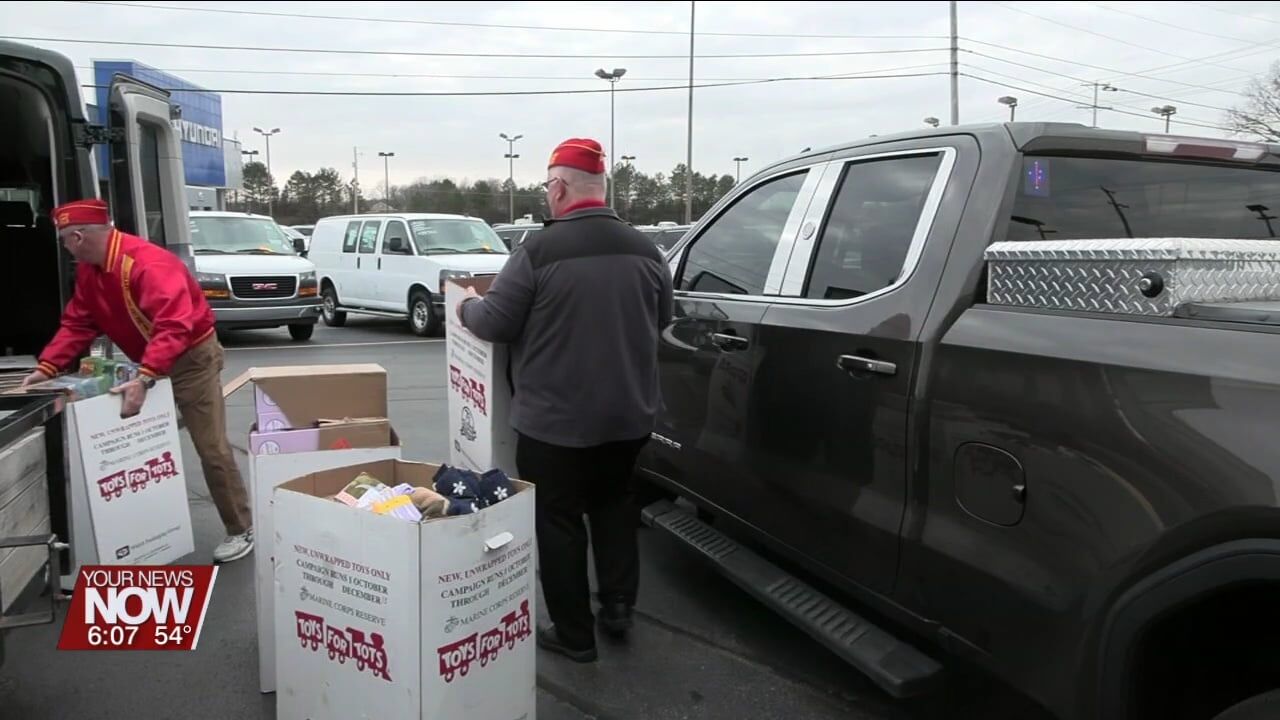 Tom Ahl Family of Dealerships and Marine Corps collaborate to make large Toys for Tots donation